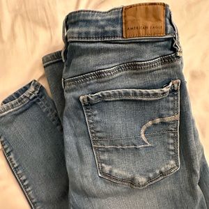Cutest multiple button light wash jean AE
